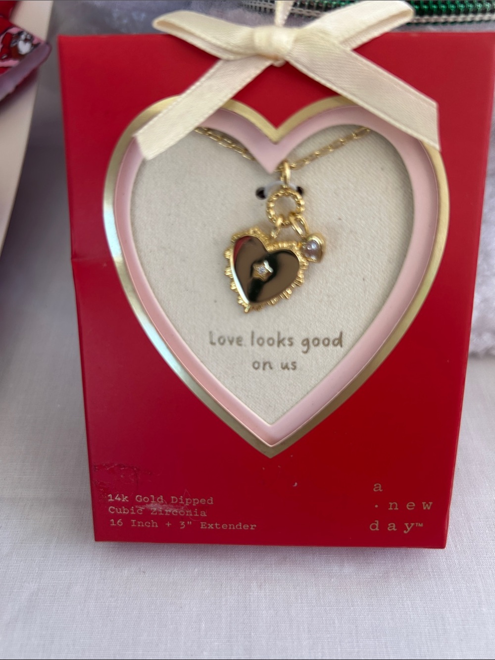 a new day Gold Heart Pendant Necklace with Black Enamel and Cubic Zirconia